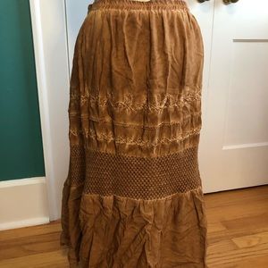 Cute camel colored skirt with unique detailing